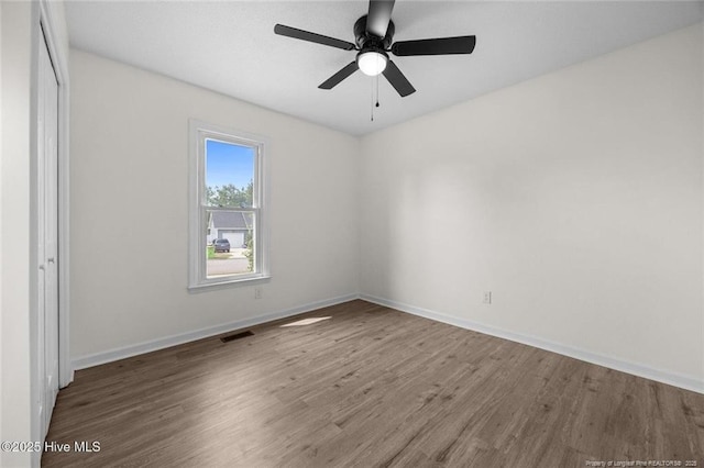 240 Eppingdale Dr, Spring Lake, NC 28390 - spare room with wood finished floors, baseboards, and ceiling fan
