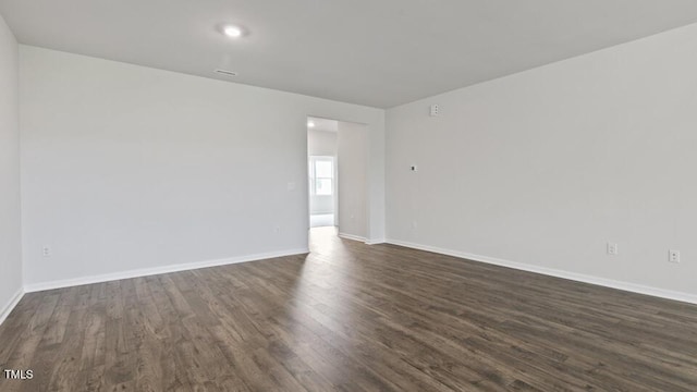 190 Babbling Creek Dr, Youngsville, NC 27596 - empty room with dark wood finished floors and baseboards