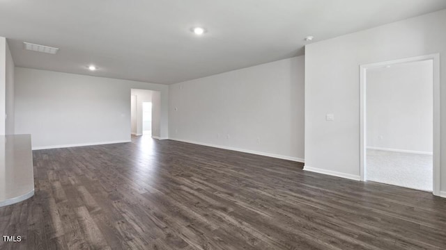 190 Babbling Creek Dr, Youngsville, NC 27596 - spare room with dark wood finished floors, baseboards, and recessed lighting