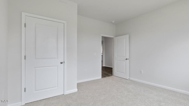 190 Babbling Creek Dr, Youngsville, NC 27596 - unfurnished bedroom with carpet floors and baseboards
