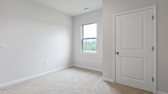 190 Babbling Creek Dr, Youngsville, NC 27596 - unfurnished bedroom featuring light carpet and baseboards