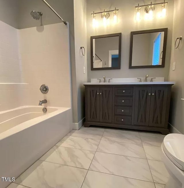 18 Danbury Ct, Pittsboro, NC 27312 - bathroom with marble look tile flooring, shower / tub combination, toilet, double vanity, and baseboards