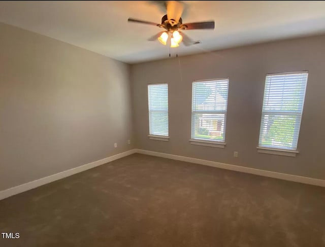 18 Danbury Ct, Pittsboro, NC 27312 - unfurnished room with dark colored carpet, baseboards, and ceiling fan