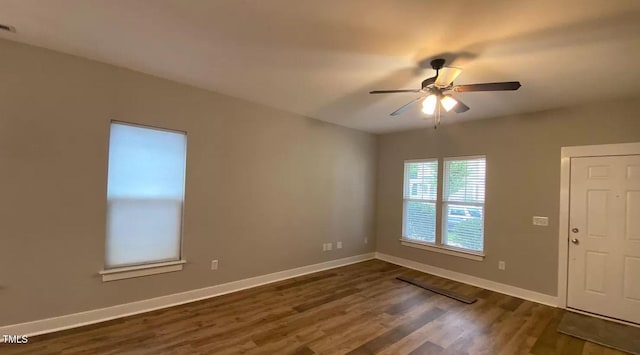 18 Danbury Ct, Pittsboro, NC 27312 - spare room featuring dark wood-type flooring, baseboards, and ceiling fan