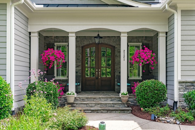 2121 Vecchio Ln, Apex, NC 27502 - entrance to property with covered porch and stone siding