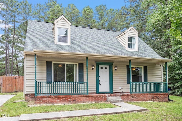 4709 Tyne Dr, Durham, NC 27703 - cape cod house with a porch and roof with shingles