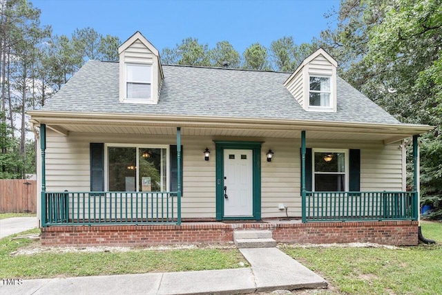 4709 Tyne Dr, Durham, NC 27703 - view of front of house featuring covered porch and a shingled roof
