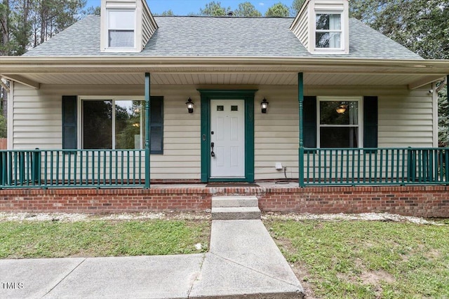 4709 Tyne Dr, Durham, NC 27703 - view of front of home with a porch and roof with shingles