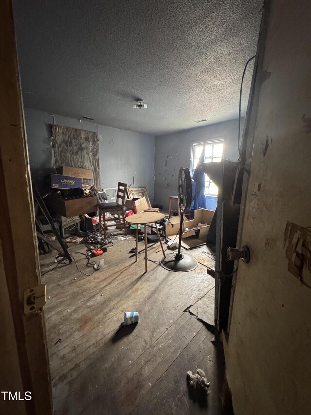 921 Franklin St, Roanoke Rapids, NC 27870 - bedroom with a textured ceiling