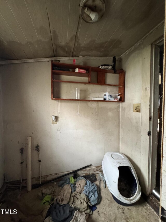 921 Franklin St, Roanoke Rapids, NC 27870 - misc room featuring unfinished concrete floors and wood ceiling