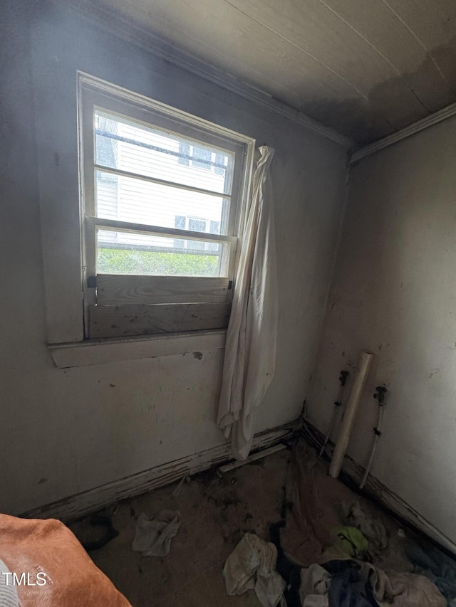 921 Franklin St, Roanoke Rapids, NC 27870 - spare room with ornamental molding