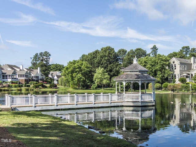 101 Lake Tillery Dr, Cary, NC 27519 - dock featuring a water view, a gazebo, a residential view, and view of wooded area