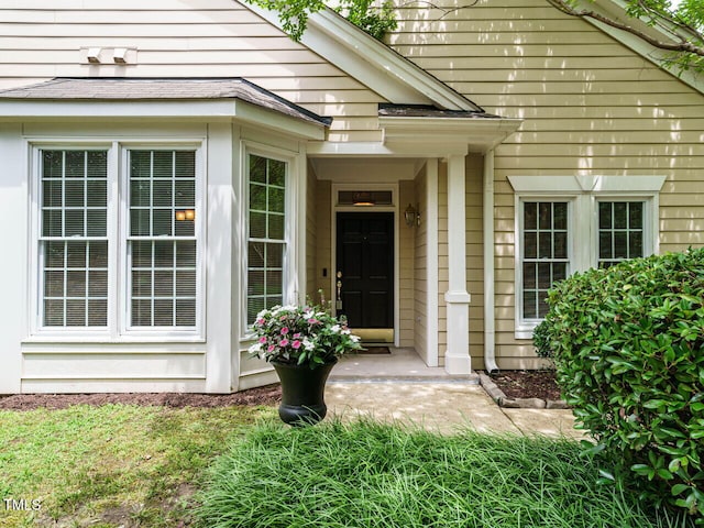 101 Lake Tillery Dr, Cary, NC 27519 - entrance to property with a shingled roof