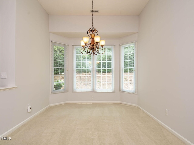 101 Lake Tillery Dr, Cary, NC 27519 - empty room with carpet flooring and a chandelier