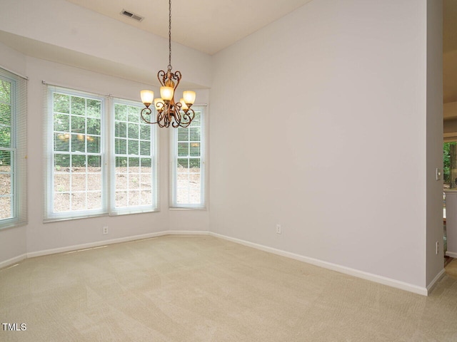 101 Lake Tillery Dr, Cary, NC 27519 - unfurnished room with light carpet and a chandelier
