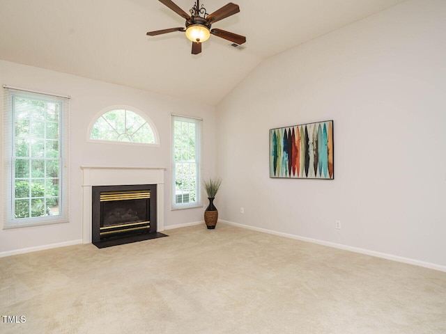 101 Lake Tillery Dr, Cary, NC 27519 - unfurnished living room with lofted ceiling, carpet flooring, a fireplace with flush hearth, and a ceiling fan