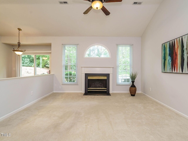 101 Lake Tillery Dr, Cary, NC 27519 - unfurnished living room with a ceiling fan, carpet, a fireplace with flush hearth, and lofted ceiling