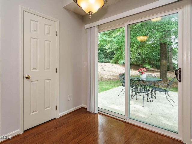 101 Lake Tillery Dr, Cary, NC 27519 - doorway to outside with wood finished floors and baseboards