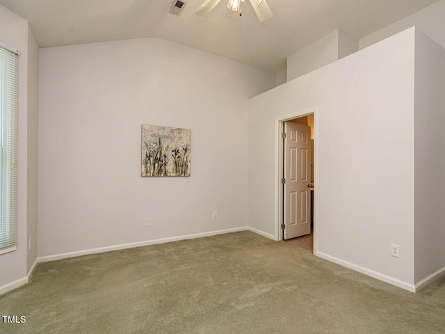 101 Lake Tillery Dr, Cary, NC 27519 - unfurnished room with carpet floors, vaulted ceiling, a ceiling fan, and plenty of natural light