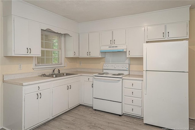 7017 Bronwyn St, Fayetteville, NC 28314 - kitchen with white appliances, a sink, under cabinet range hood, and white cabinets