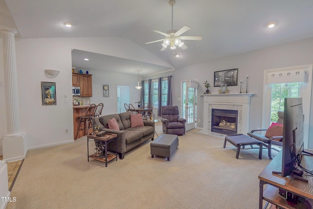 734 Crystal Forest Dr, Semora, NC 27343 - living room with decorative columns, light colored carpet, plenty of natural light, lofted ceiling, and recessed lighting