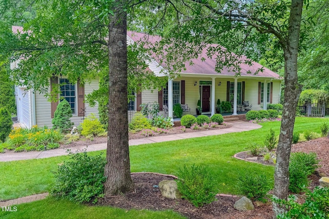 734 Crystal Forest Dr, Semora, NC 27343 - view of front of home with covered porch and a front lawn