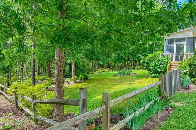 734 Crystal Forest Dr, Semora, NC 27343 - view of yard with a sunroom