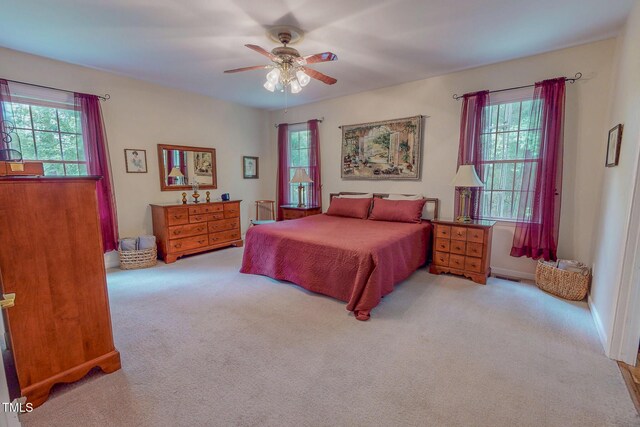734 Crystal Forest Dr, Semora, NC 27343 - carpeted bedroom featuring a ceiling fan