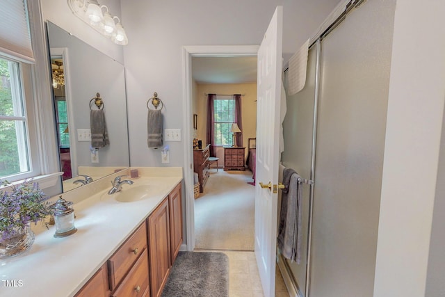 734 Crystal Forest Dr, Semora, NC 27343 - bathroom featuring an enclosed shower, vanity, and tile patterned floors