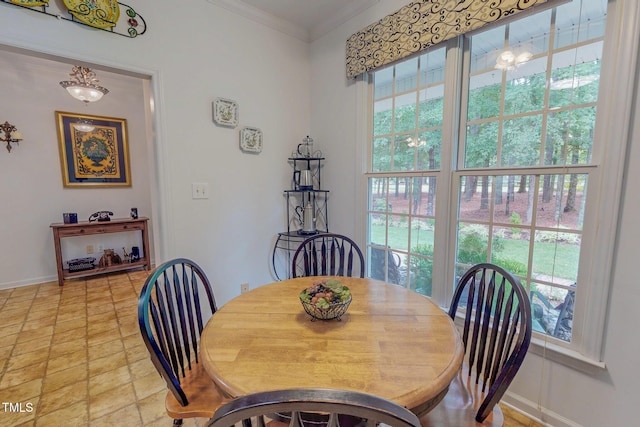 734 Crystal Forest Dr, Semora, NC 27343 - dining room featuring plenty of natural light, crown molding, and light stone finish floors