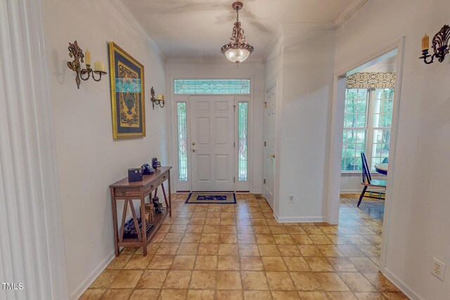 734 Crystal Forest Dr, Semora, NC 27343 - entryway featuring ornamental molding and light stone finish flooring