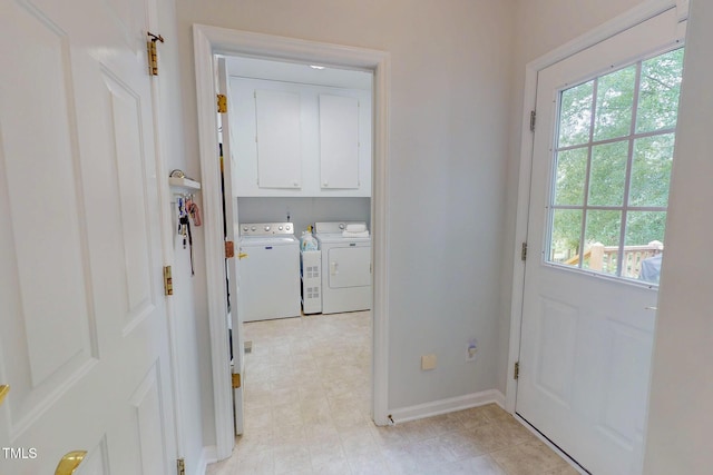 734 Crystal Forest Dr, Semora, NC 27343 - entryway with washing machine and clothes dryer, healthy amount of natural light, and light flooring