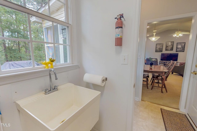 734 Crystal Forest Dr, Semora, NC 27343 - bathroom with plenty of natural light, ceiling fan, and vaulted ceiling