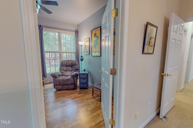 734 Crystal Forest Dr, Semora, NC 27343 - living area featuring ceiling fan and wood finished floors