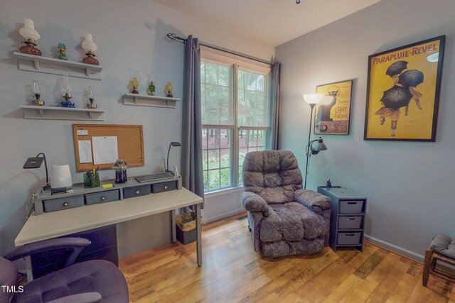 734 Crystal Forest Dr, Semora, NC 27343 - office area with wood finished floors and baseboards