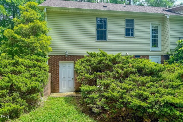 734 Crystal Forest Dr, Semora, NC 27343 - rear view of house featuring a shingled roof