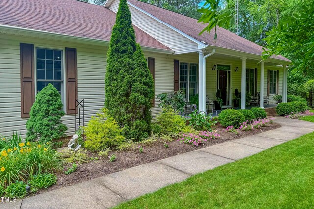 734 Crystal Forest Dr, Semora, NC 27343 - view of front of home featuring covered porch and a shingled roof