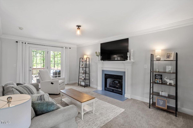 1990 Ferbow St, Creedmoor, NC 27522 - carpeted living room with ornamental molding and a fireplace with raised hearth