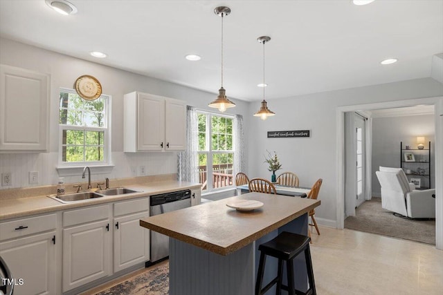 1990 Ferbow St, Creedmoor, NC 27522 - kitchen featuring dishwasher, plenty of natural light, white cabinets, and recessed lighting