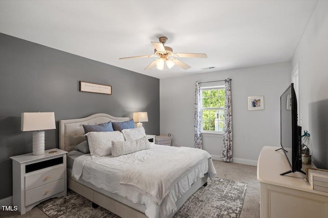 1990 Ferbow St, Creedmoor, NC 27522 - carpeted bedroom featuring baseboards and ceiling fan
