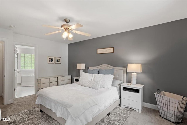 1990 Ferbow St, Creedmoor, NC 27522 - carpeted bedroom featuring ceiling fan and connected bathroom
