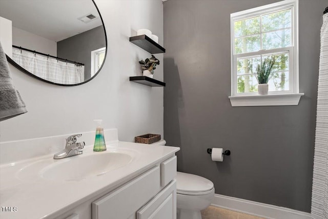 1990 Ferbow St, Creedmoor, NC 27522 - full bath featuring vanity and plenty of natural light