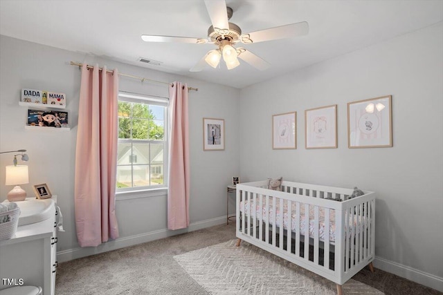 1990 Ferbow St, Creedmoor, NC 27522 - carpeted bedroom with a nursery area and a ceiling fan