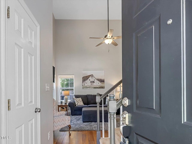 221 Antique Lace Way, Holly Springs, NC 27540 - entrance foyer with ceiling fan, wood finished floors, and stairway