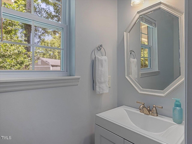 221 Antique Lace Way, Holly Springs, NC 27540 - bathroom with vanity and healthy amount of natural light