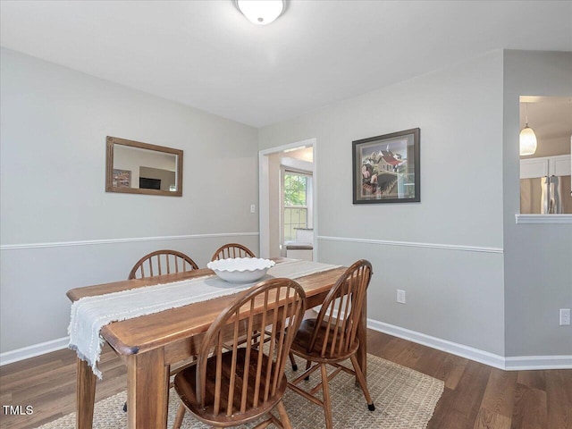 221 Antique Lace Way, Holly Springs, NC 27540 - dining area featuring wood finished floors and baseboards
