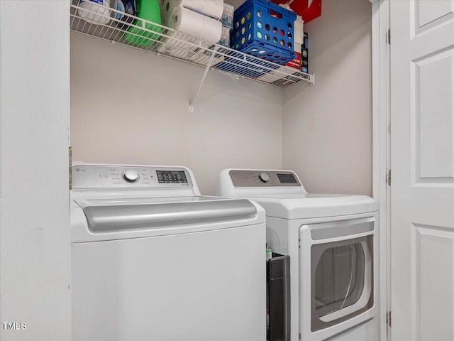 221 Antique Lace Way, Holly Springs, NC 27540 - laundry area with washer and dryer