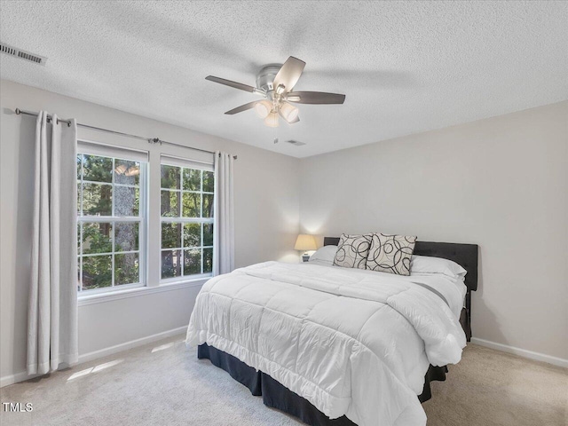 221 Antique Lace Way, Holly Springs, NC 27540 - carpeted bedroom featuring a textured ceiling and ceiling fan