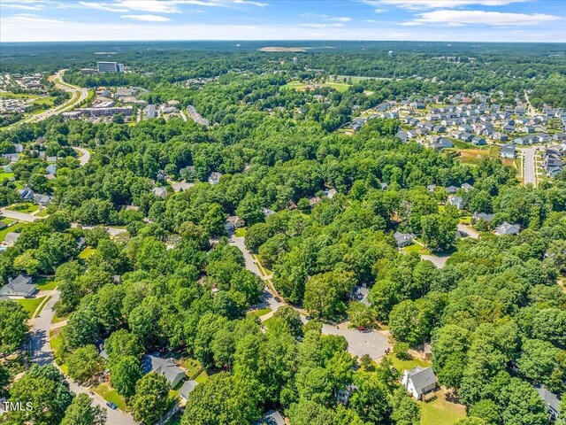 221 Antique Lace Way, Holly Springs, NC 27540 - aerial view of property's location featuring a forest