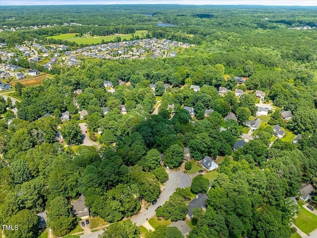 221 Antique Lace Way, Holly Springs, NC 27540 - aerial overview of property's location with a forest